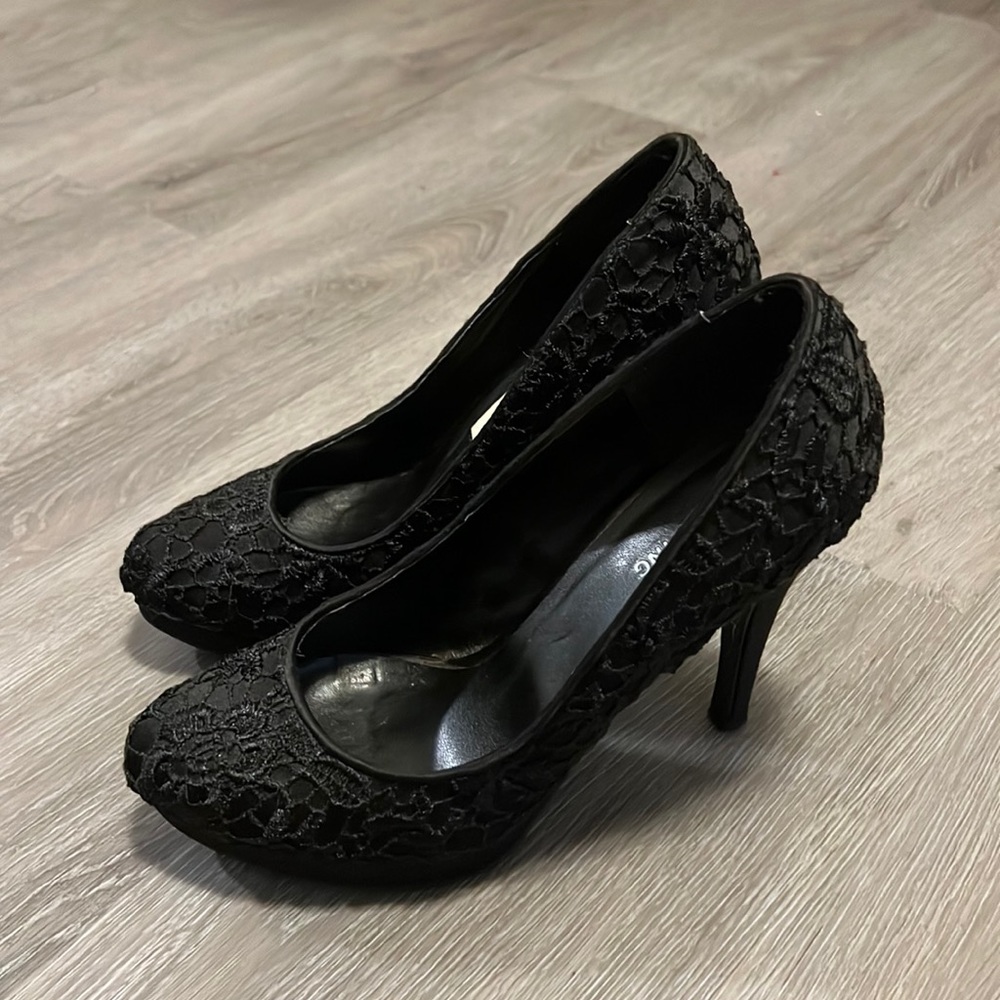 Call it Spring black heel shoes. Size 8